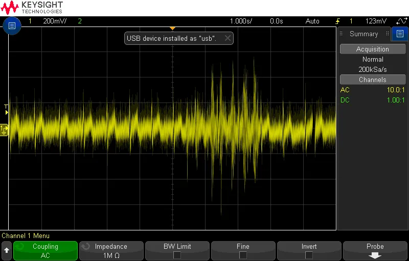 Oscilloscope capture of the unfiltered output with a large burst of motion noise